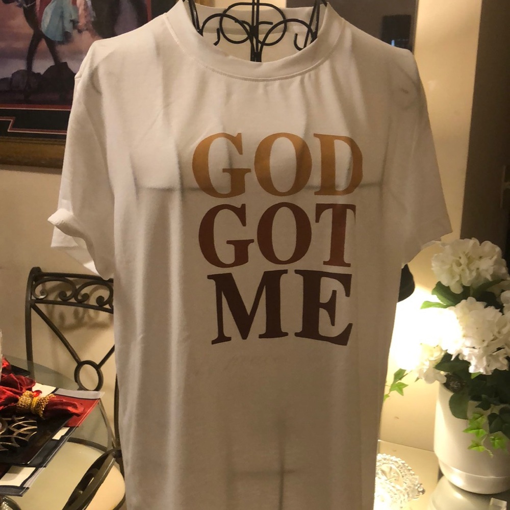 GOD Got Mei. White T-Shirt with Gold and Brown Text